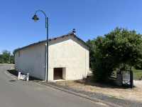 Riverside Property with Attached Barn and Gardens