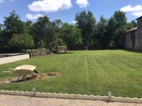 Riverside Property with Attached Barn and Gardens