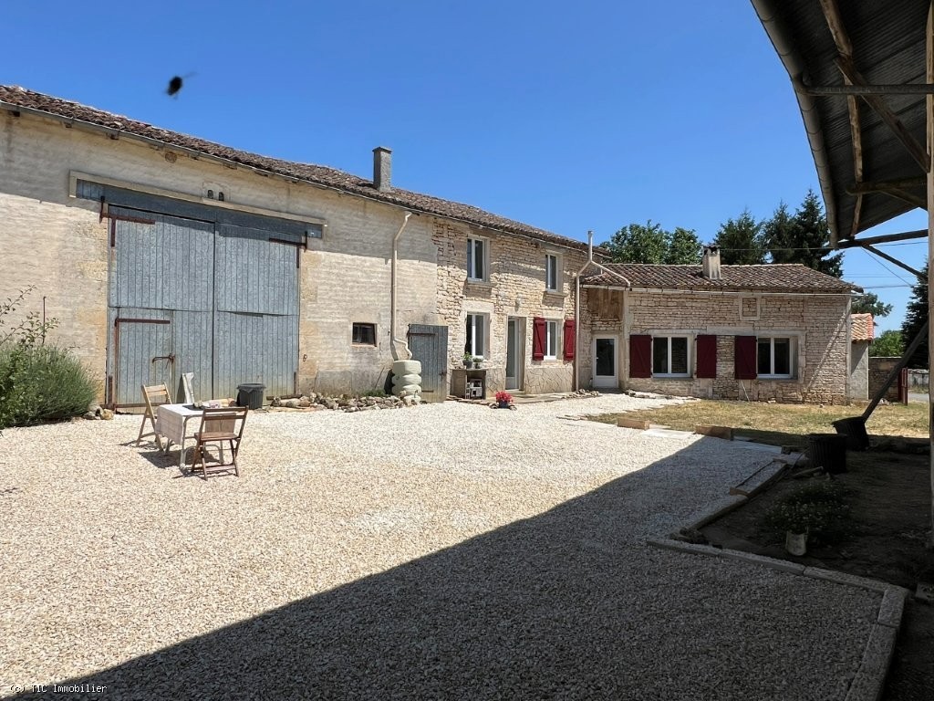 Charming Stone House with Outbuildings and Enclosed Courtyard – Near Sauzé-Vaussais