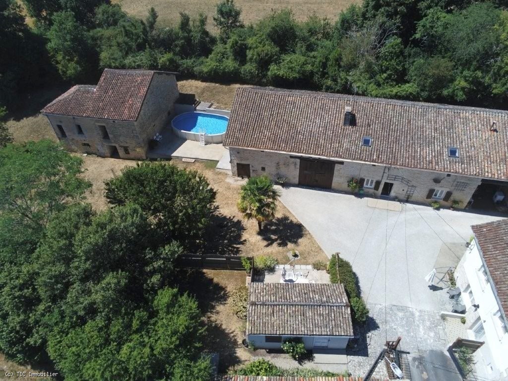 Charming Property with Two Houses, Barn, and Woodland – Near Civray