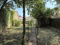 Townhouse in Ruffec with Outbuildings, Garden, and Great Potential