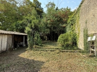 Townhouse in Ruffec with Outbuildings, Garden, and Great Potential