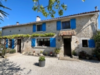 Attractive Character Stone House with Lovely Garden Close To Villefagnan