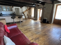 Riverside Property with Attached Barn and Gardens