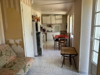 Au Cœur de Ruffec – Deux Maisons de Plain-Pied en Pierre avec Jardinet