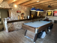 Riverside Property with Attached Barn and Gardens