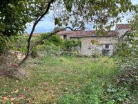 Village House with Large Outbuilding at rear