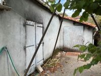 Village House with Large Outbuilding at rear