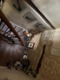 Townhouse in Ruffec with Outbuildings, Garden, and Great Potential