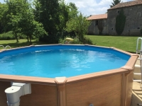Riverside Property with Attached Barn and Gardens