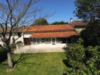 Charming Country House For Sale in a Peaceful Setting with Open Field Views