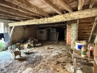 Townhouse in Ruffec with Outbuildings, Garden, and Great Potential