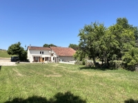 Riverside Property with Attached Barn and Gardens