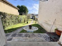 Maison de Caractère avec 3 Chambres, Jardin et Garage à Ruffec